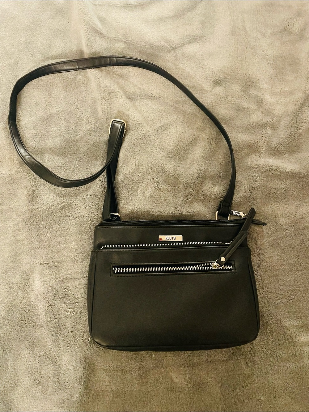 Roots Black Leather Crossbody Bag with Silver Zippers